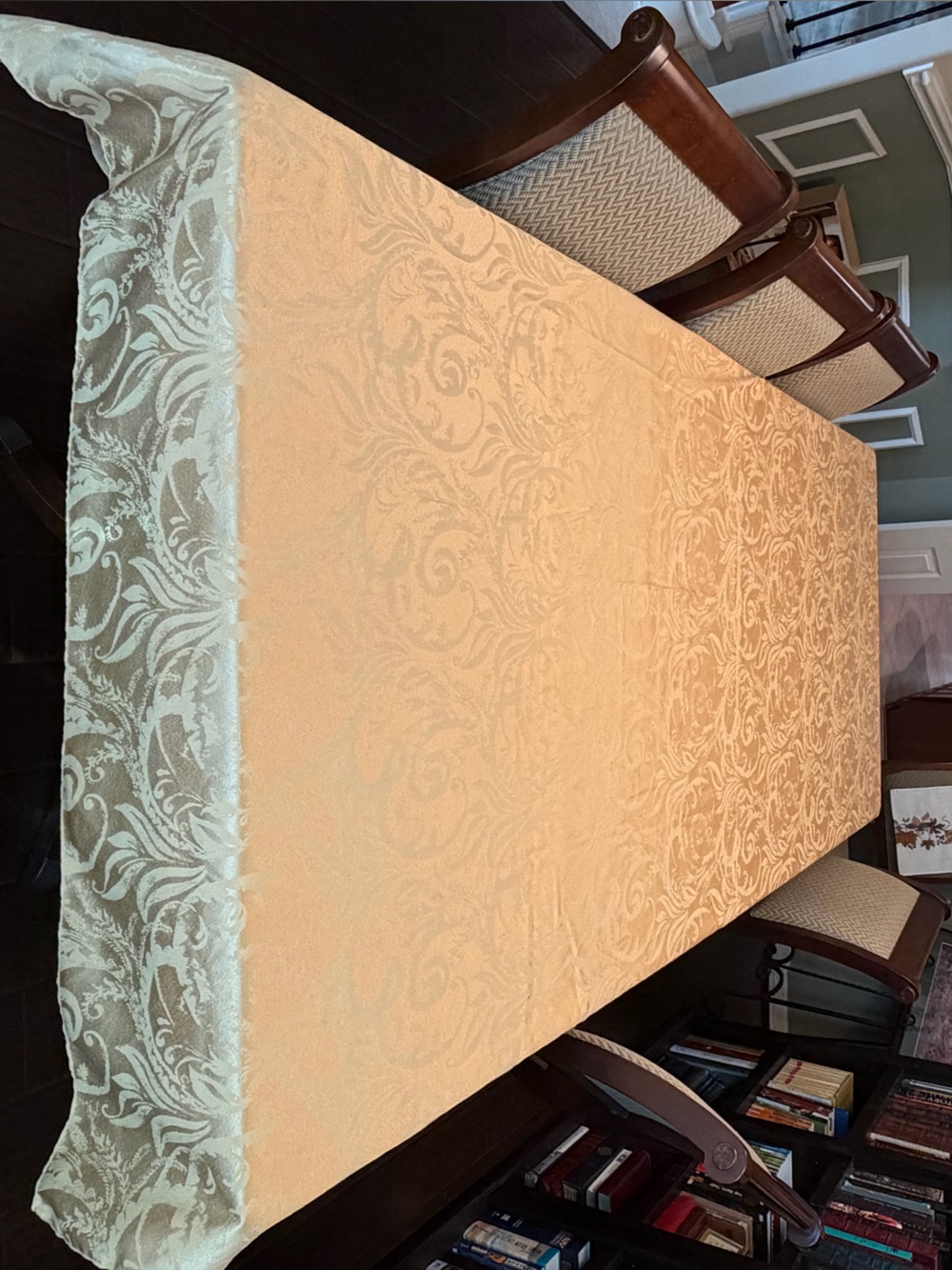 Gold damask tablecloth.